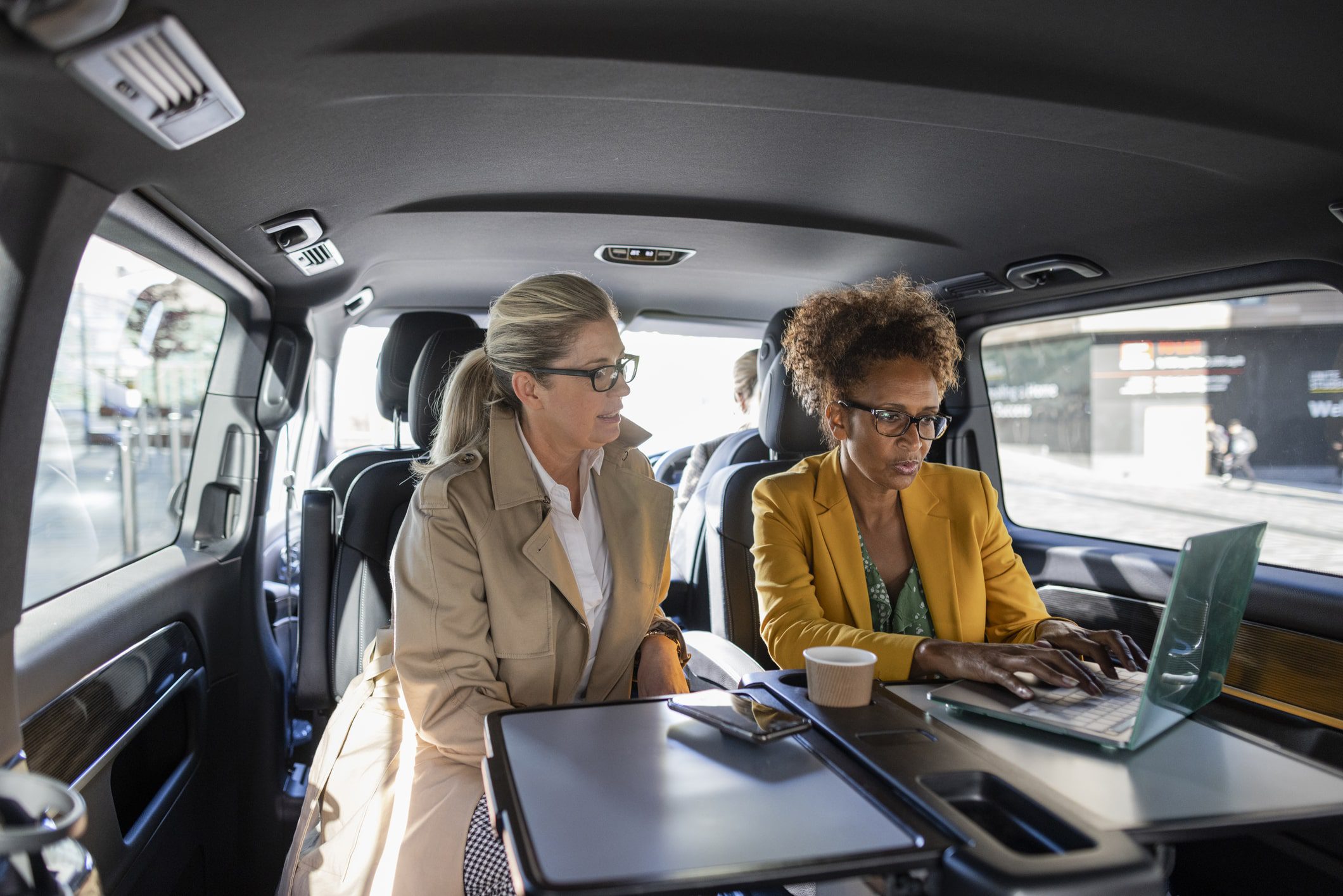 professionals working in back of minibus in birmingham