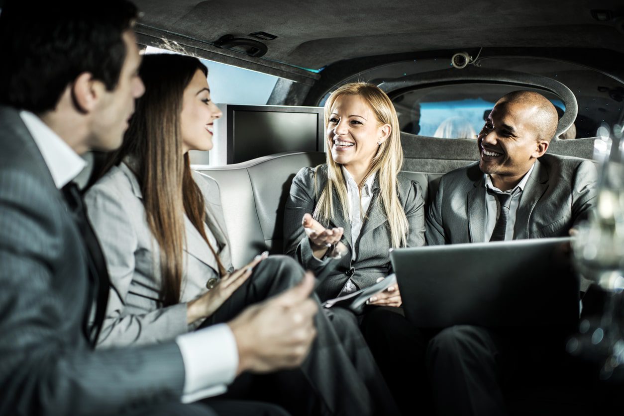 corporate team in limousine